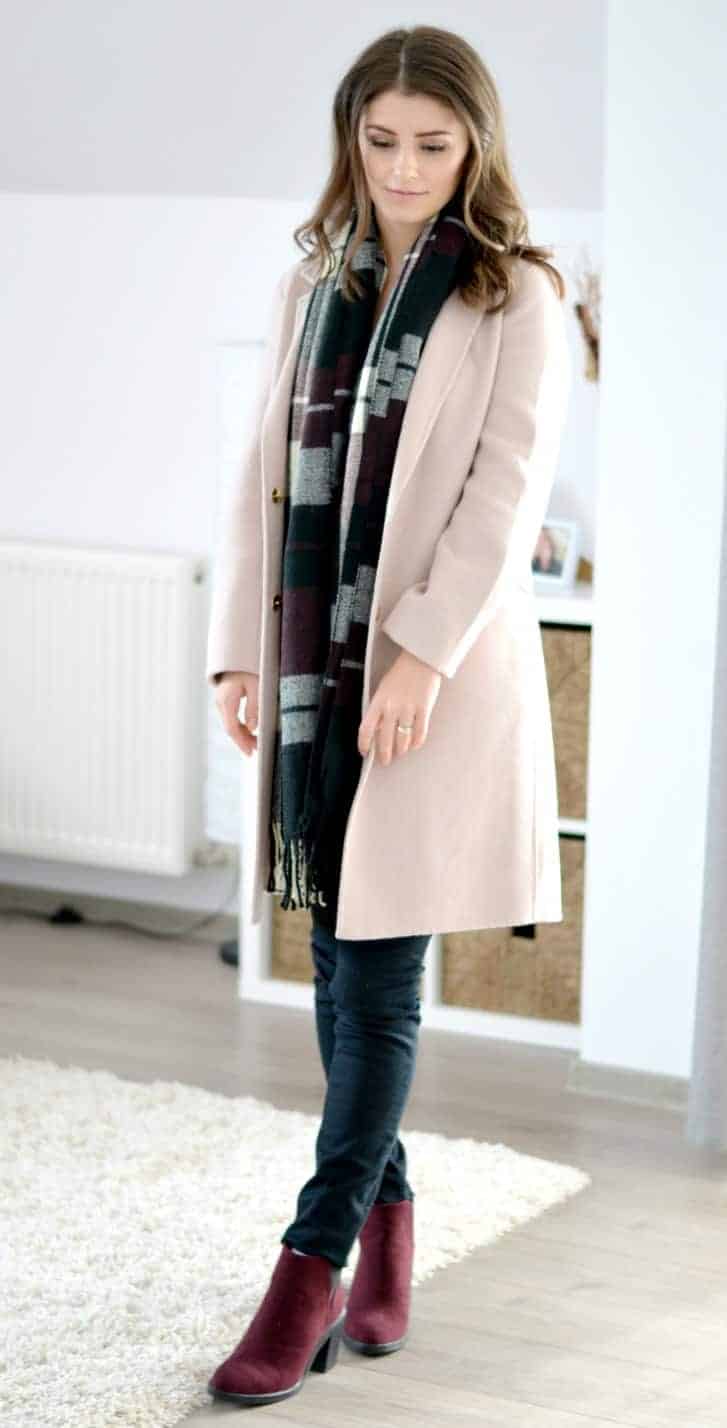 dusty pink coat with burgundy blanket scarf and ankle boots for fall and winter